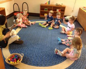 Childrens are listening music in group. Method of Learning Montessori Education